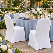White banquet chair covers at an outdoor wedding reception - thumbnail number 6