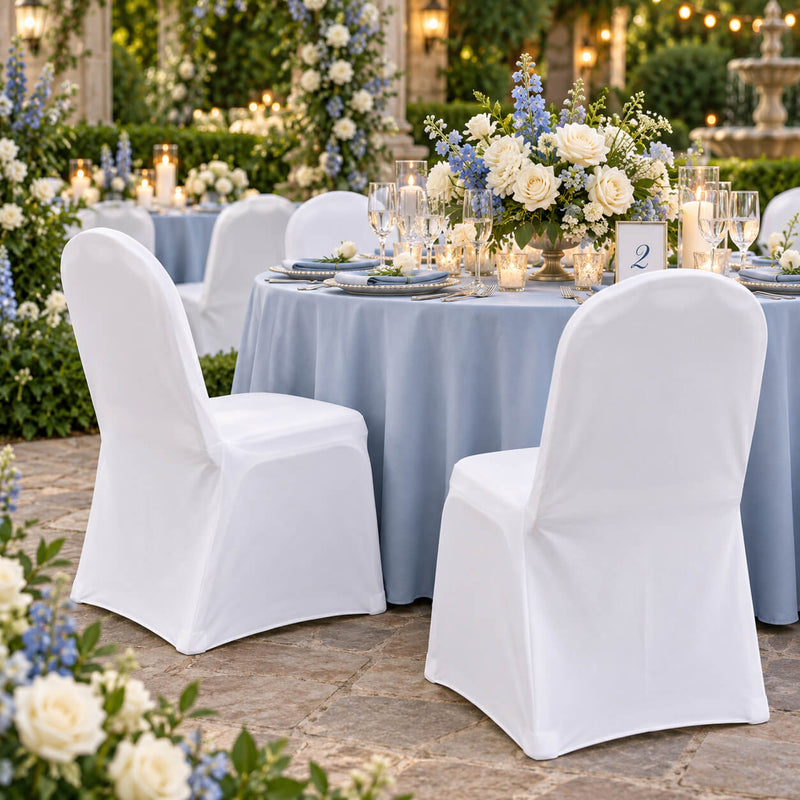 White banquet chair covers at an outdoor wedding reception - thumbnail number 6