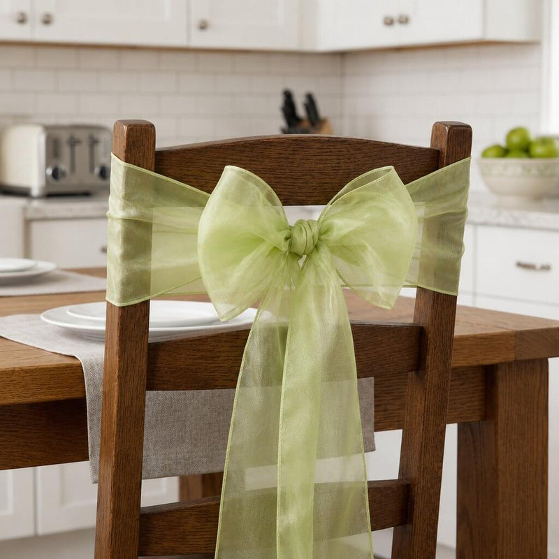Wooden chair decorated with a sage organza sash tied in a bow - thumbnail number 10