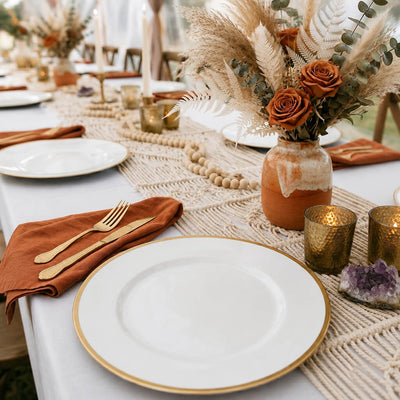 Boho-style tablescape with gold-rimmed plates - thumbnail number 3