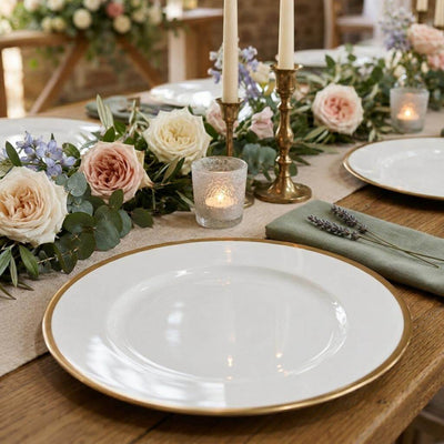 Gold-rimmed plate on a rustic floral tablescape - thumbnail number 4