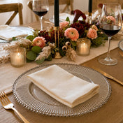 13 inch silver rim glass charger plate with napkin on a table with floral centerpiece - thumbnail number 6