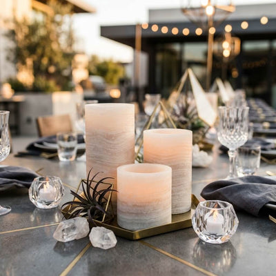 Flameless marble pillar candles on elegant modern outdoor dining table - thumbnail number 6