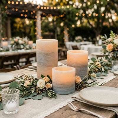 Serene outdoor tablescape with glowing marble flameless candles and flowers - thumbnail number 5