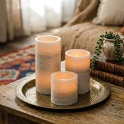 Glowing marble LED pillar candles on vintage tray with cozy home decor - thumbnail number 9