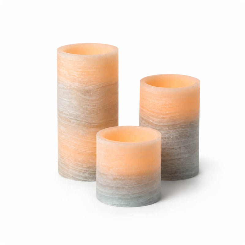 Set of glowing marble flameless LED pillar candles on white background - thumbnail number 4