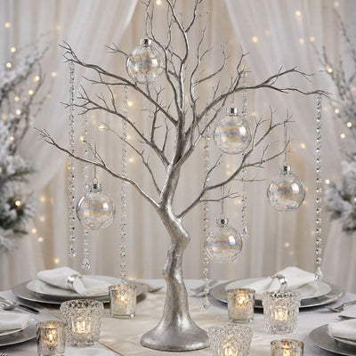 Iridescent glass ornaments hanging from a silver decorative centerpiece tree - thumbnail number 2