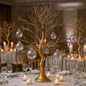 Iridescent glass ornaments hanging from a gold decorative centerpiece tree - thumbnail number 3