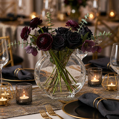 Dark floral centerpiece in a glass vase on a formal dining table - thumbnail number 4