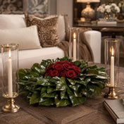 Red roses on magnolia wreath with glass candle holders - thumbnail number 2