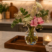 Glass vase with flowers on a wooden tray with a candle - thumbnail number 10