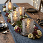 Pearly silver candle holders with floral decor on a rustic wooden dining table - thumbnail number 5