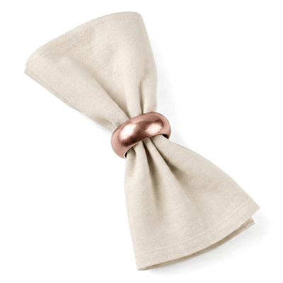 A rose gold napkin ring cinches a beige linen napkin - thumbnail number 2