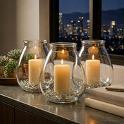 Three lit candles in a Glass Vase Large on a ledge with a city skyline view - thumbnail number 8