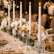 Five lit white taper candles in Square Glass Taper Candle Holders in a floral runner - thumbnail number 6