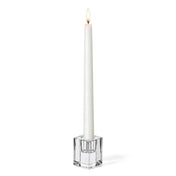Lit white candle in a 2.5" Square Glass Taper Candle Holder on a white background - thumbnail number 3