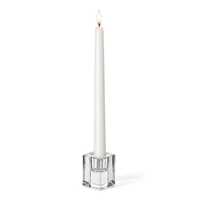 Lit white candle in a 2.5" Square Glass Taper Candle Holder on a white background - thumbnail number 3