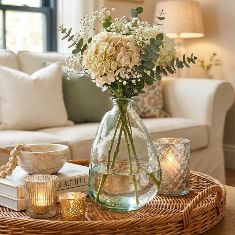 4.5" teardrop glass bottle with hydrangeas and baby's breath on a tray - thumbnail number 7