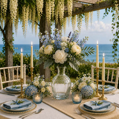 Floral centerpiece in a glass bottle on an oceanfront table setting - thumbnail number 3
