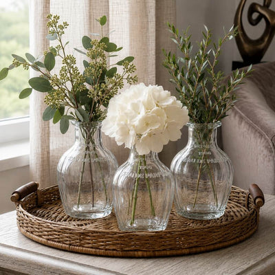 Three vintage French parfum glass bottles with flowers on a round wicker tray - thumbnail number 7