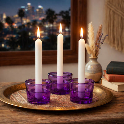 Three lit white taper candles in purple glass holders on a brass tray - thumbnail number 10