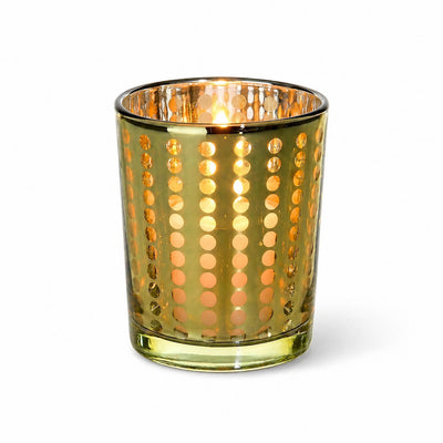 Small gold dotted glass holder with a glowing lit candle inside on a white background - thumbnail number 3