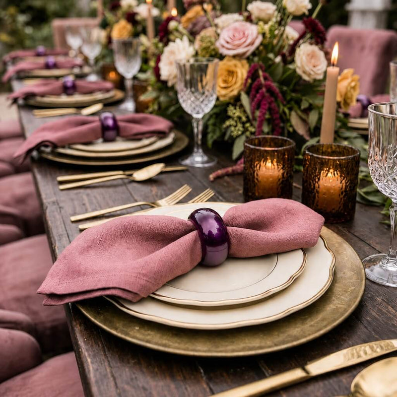 A 2.3-inch eggplant napkin ring holding a pink napkin on a gold charger plate - thumbnail number 5