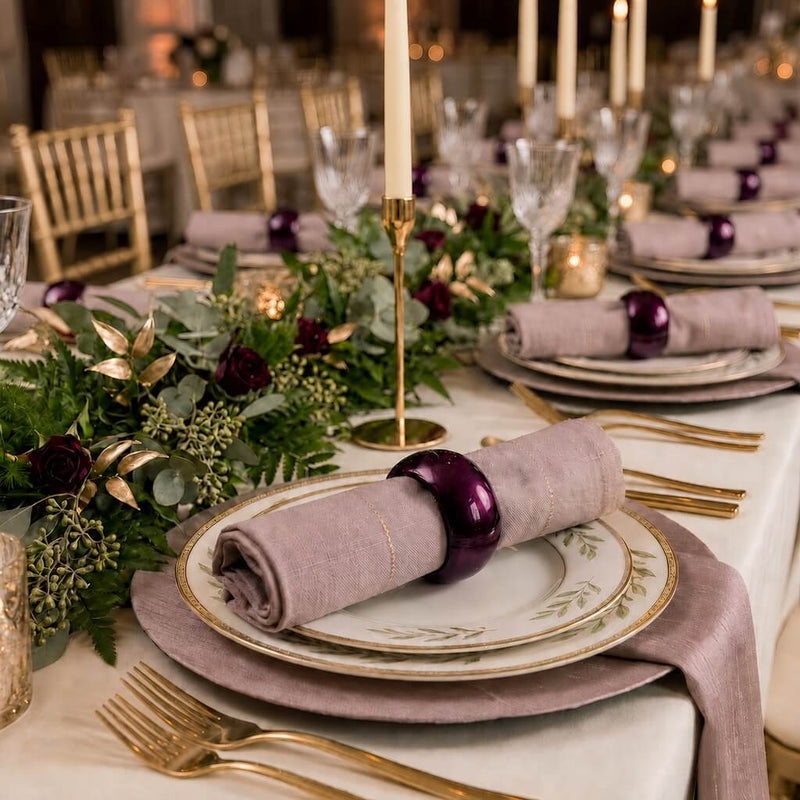 A 2.3-inch eggplant napkin ring holding a napkin on a table setting - thumbnail number 3