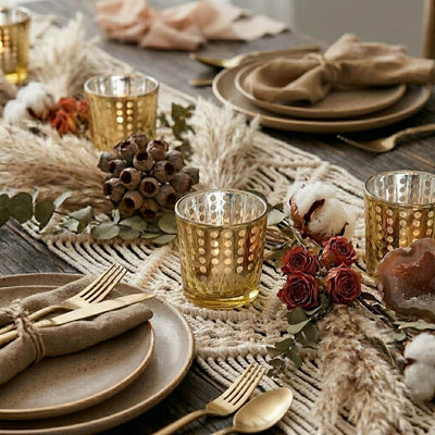 Gold dotted holders on a macrame runner with pampas grass, dried roses, and rustic place settings - thumbnail number 5