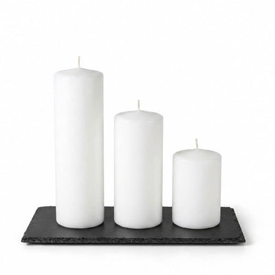 Three white pillar candles staggered on a rectangle natural slate coaster - thumbnail number 2