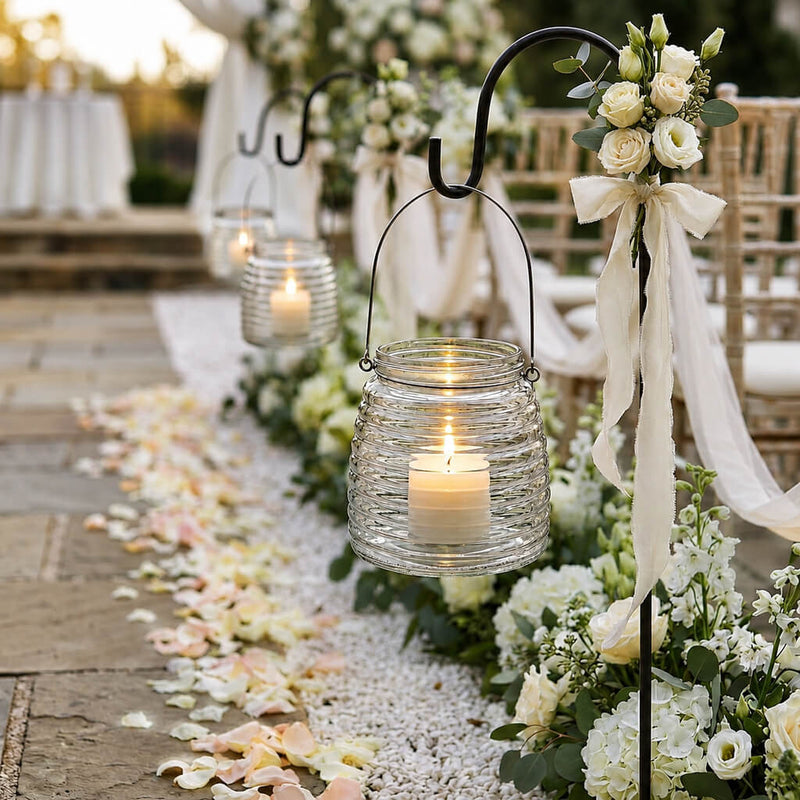 4.6" Hanging Horizontal Ribbed Glass Jar with Handle holding a candle at an upscale wedding aisle - thumbnail number 4