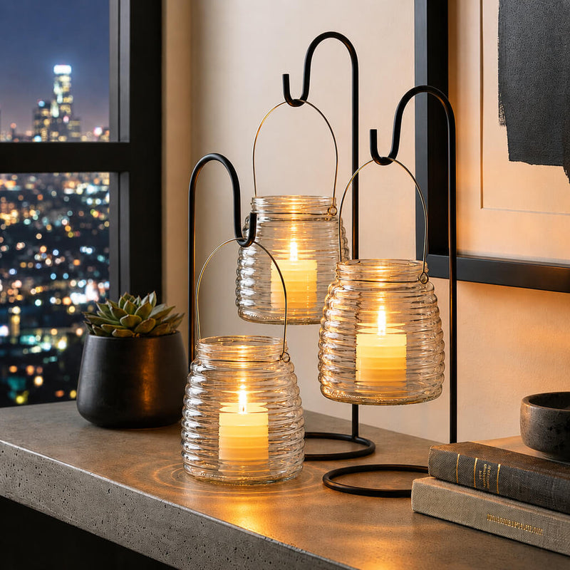 4.6" Hanging Horizontal Ribbed Glass Jar with Handle holding a candle on a city-view ledge - thumbnail number 7