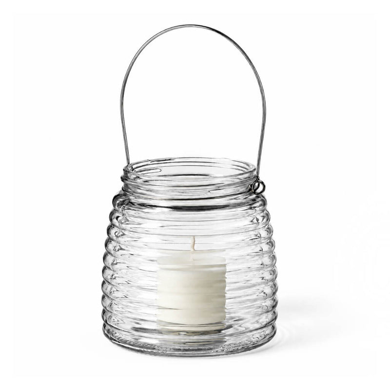 White votive candle in a 4.6" Hanging Horizontal Ribbed Glass Jar with Handle - thumbnail number 2