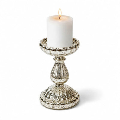 7" Ribbed Unique Mercury Glass Pillar Candle Holder holding a lit white candle on a white backdrop - thumbnail number 3