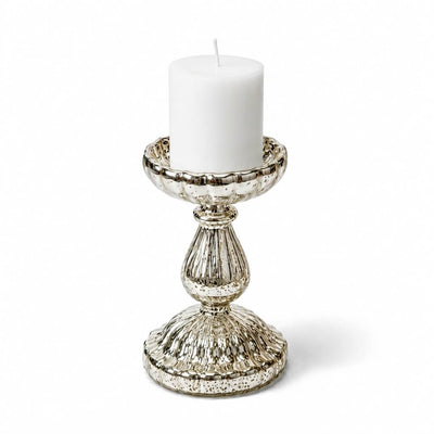 7" Ribbed Unique Mercury Glass Pillar Candle Holder holding an unlit white candle on white backdrop - thumbnail number 2
