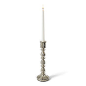 Lit white taper candle in a 13" Ribbed Unique Mercury Glass Taper Candle Holder - thumbnail number 3