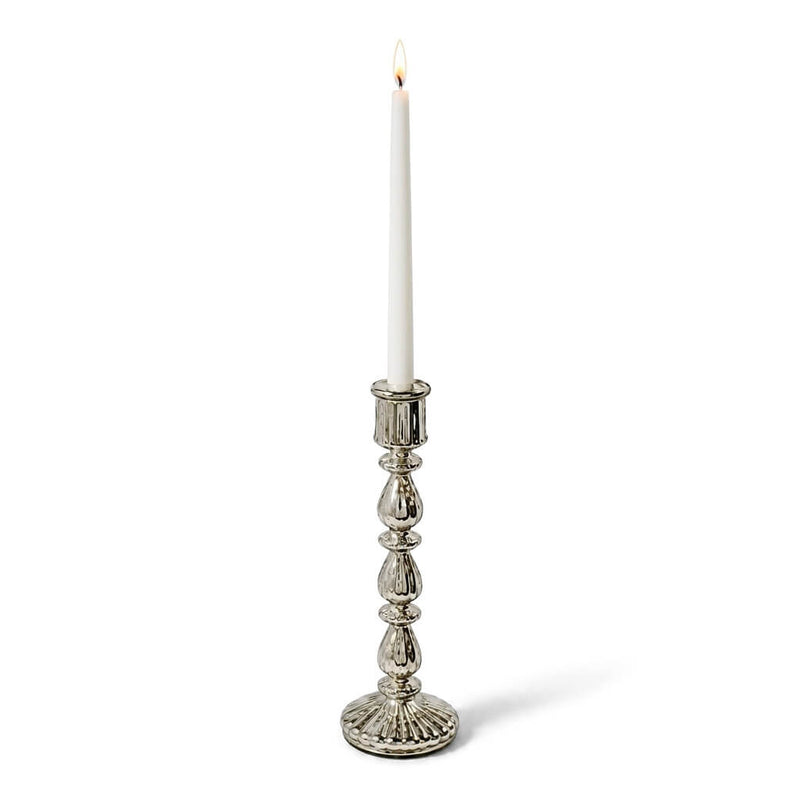 Lit white taper candle in a 13" Ribbed Unique Mercury Glass Taper Candle Holder - thumbnail number 3