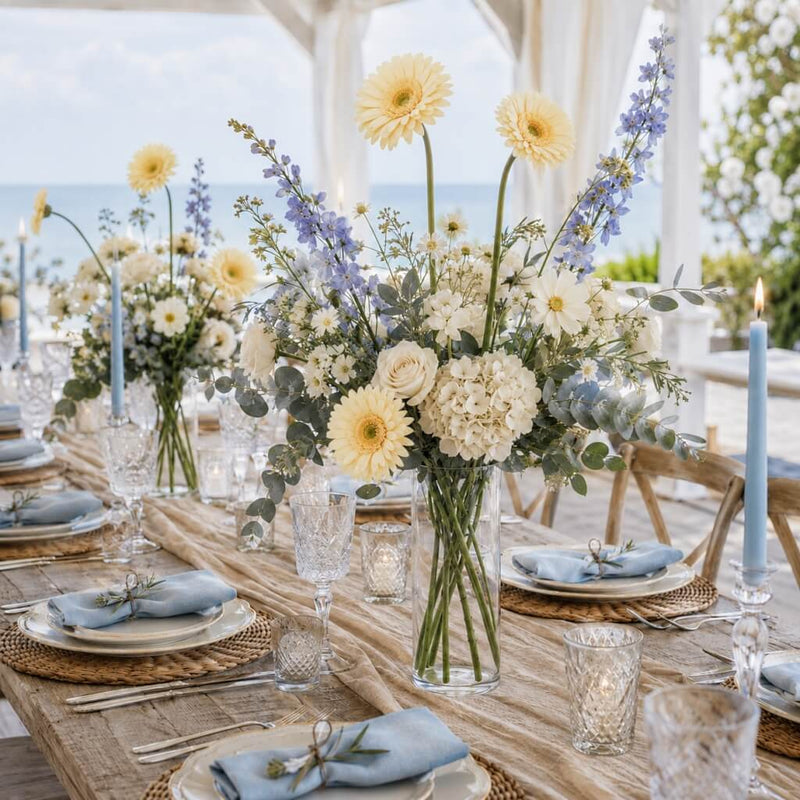24" yellow gerbera daisies in a seaside floral centerpiece on a wedding table - thumbnail number 6