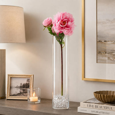 A 22-inch pink peony spray in a tall glass cylinder vase on a table - thumbnail number 6