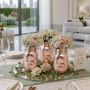 Rose gold mercury mason jars with flowers on a table - thumbnail number 6