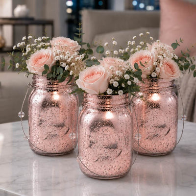 Rose gold mercury mason jars with pink roses on a table - thumbnail number 8