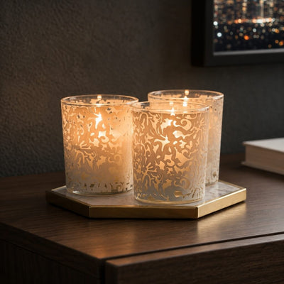 White lace votive candle holders glowing on modern wooden table decor - thumbnail number 7