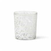 White Lace Design Votive Candle Holder standing on a white backdrop - thumbnail number 1