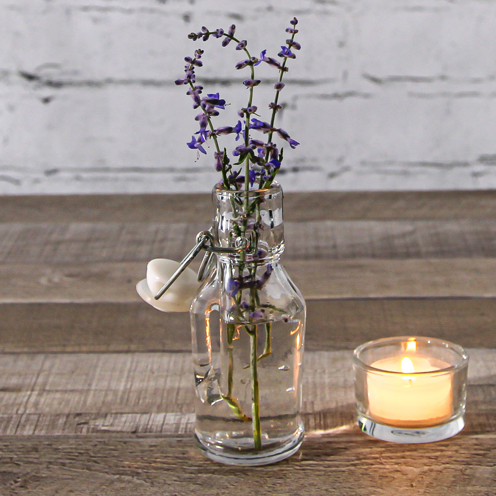 Super cute votive mini-mason jar with handles. Perfect condition. Set of 3