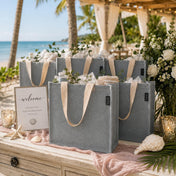 12" x 12" gray recycled canvas tote bags filled with gifts on a beach wedding welcome table - thumbnail number 6