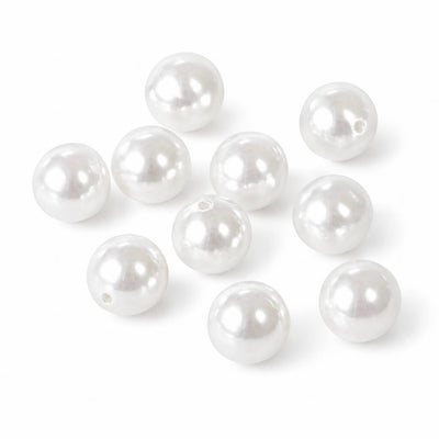 A close-up of ten 10mm glossy white faux pearl beads with visible holes - thumbnail number 1