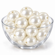 Glass bowl filled with glossy ivory faux pearl beads with center holes - thumbnail number 2