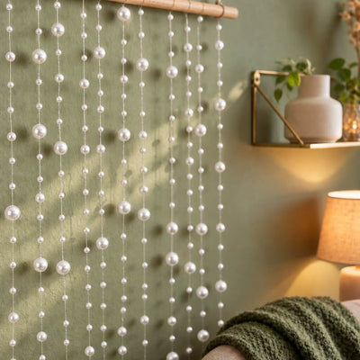 Hanging white faux pearl string beads used as a decorative wall backdrop - thumbnail number 8