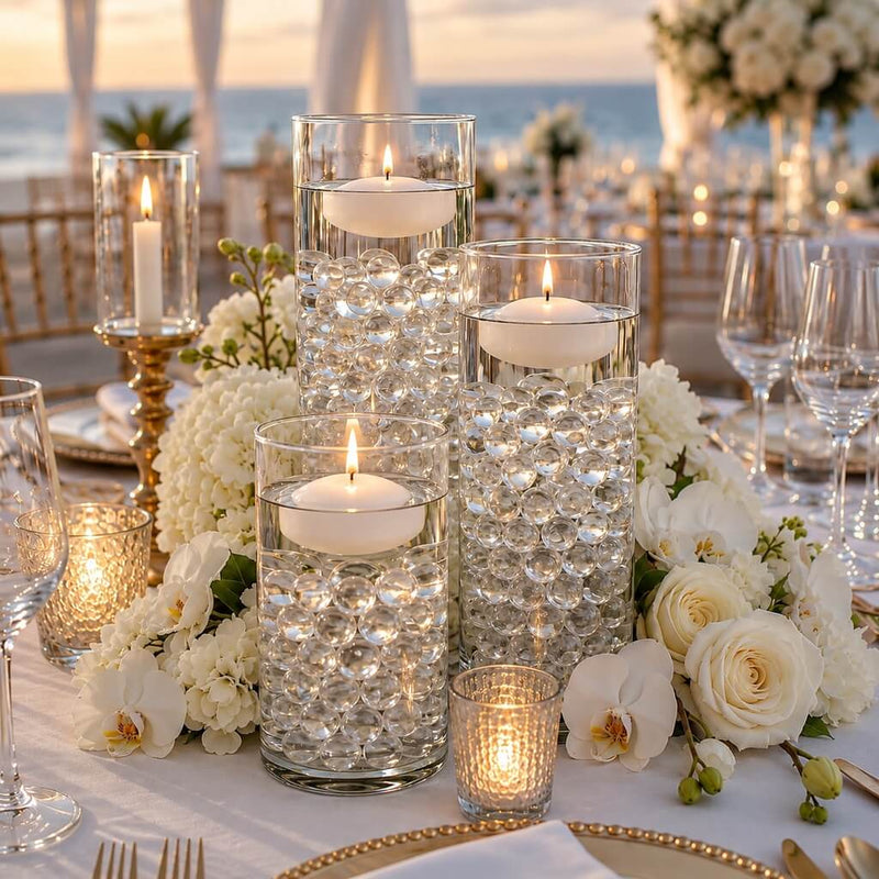 Glass vases filled with clear water gel beads and floating candles - thumbnail number 4