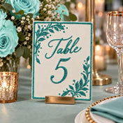 Table 5 sign with turquoise glitter detailing in a wedding setting - thumbnail number 3